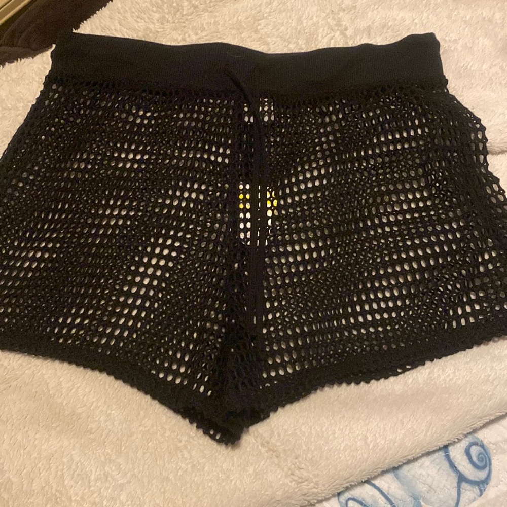 Black bathing suit shorts cover up